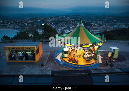 Spain, Basque Country Region, Guipuzcoa Province, San Sebastian, Monte Igueldo amusement park, dusk Stock Photo