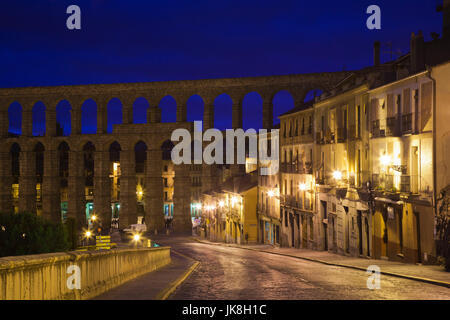 Spain, Castilla y Leon Region, Segovia Province, Segovia, town view over Plaza de Artilleria with El Acueducto, Roman Aqueduct, dawn Stock Photo