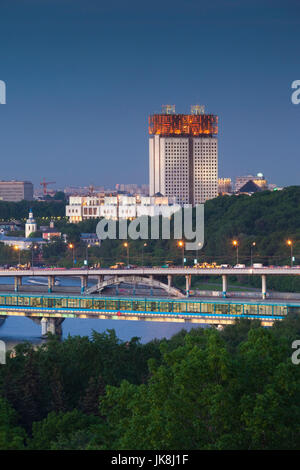 Russia, Moscow Oblast, Moscow, Sparrow Hills-area, elevated city view with the Russian Academy of Sciences, RAN, building, dusk Stock Photo