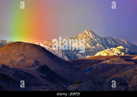 Rainbow over Eastern Sierra Mountains near Bishop, California Stock Photo