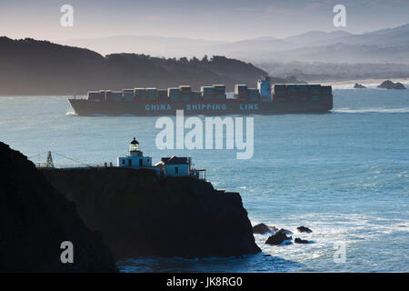 USA, California, San Francisco Bay Area, Marin Headlands, Golden Gate National Recreation Area, Point Bonita Lighthouse and ship Stock Photo