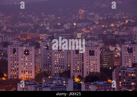 France, Puy-de-Dome Department, Auvergne Region, Clermont-Ferrand, city overview from Parc de Monjuzet, dusk Stock Photo
