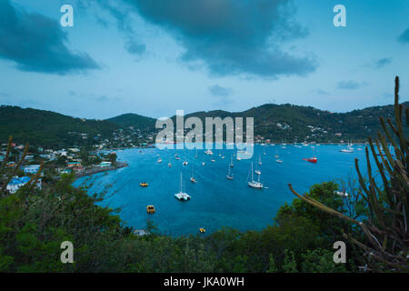 St. Vincent and the Grenadines, Bequia, Port Elizabeth, elevated town view from the Hamilton Battery, dusk Stock Photo