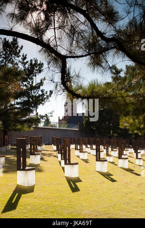 USA, Oklahoma, Oklahoma City, Oklahoma City National Memorial to the victims of the Alfred P. Murrah Federal Building Bombing on April 19, 1995, bronze chair memorials to each of the victims Stock Photo