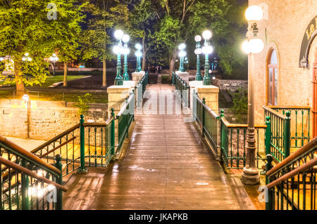 Quebec City, Canada - May 30, 2017: Famous wooden stairs or steps on lower old town street Escalier Frontenac Casse-Cou by restaurants Stock Photo