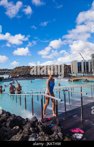 People enjoying the warmth and relaxation of the Blue Lagoon geothermal pool in Iceland Stock Photo