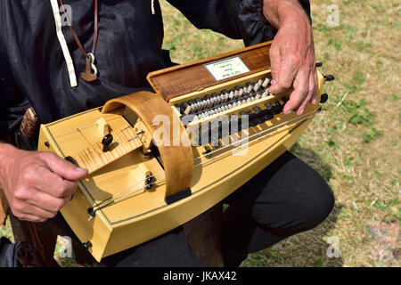 close up of man playing hurdy gurdy musical instrument Stock Photo - Alamy