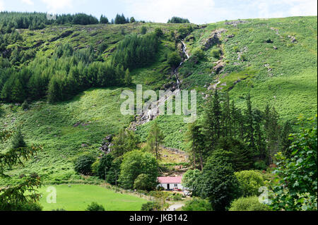 Carrawaystick Waterfall above a farm in Glenmalure, Wicklow Mountains, County Wicklow, Ireland Stock Photo