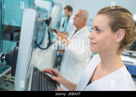 portrait of a female researcher doing research in a lab Stock Photo