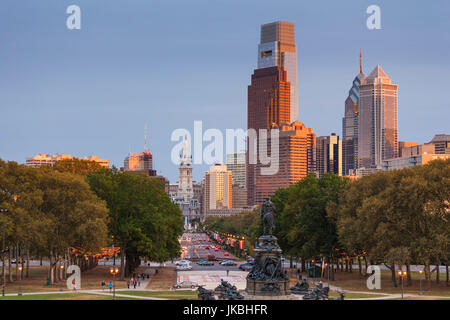 USA, Pennsylvania, Philadelphia, city skyline from the Benjamin Franklin Parkway, dusk Stock Photo