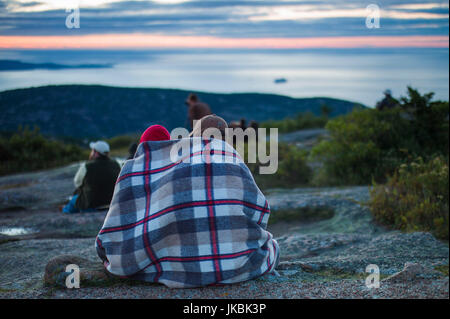 USA, Maine, Mt. Desert Island, Acadia National Park, Cadillac Mountain, elev.1530 feet, visitors at Dawn, NR Stock Photo