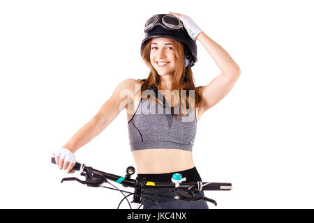 girl with a mountainbike wearing an us army style aviation helmet Stock Photo