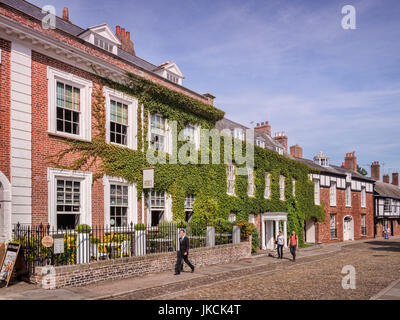 20 June 2017: Exeter, Devon, UK - Houses in Cathedral Close, Exeter, across the Green from the Cathedral. Stock Photo