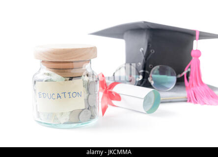 education budget concept. education money savings in a glass jar with glasses, graduate hat and book isolated on white background Stock Photo