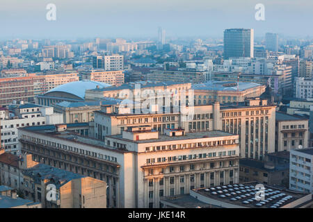 Romania, Bucharest, city skyline, elevated view over former Communist Party Central Comittee Building, now government Interior Ministry, dawn Stock Photo