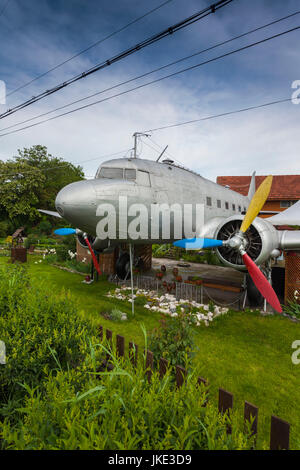 Romania, Transylvania, Faget, Russian-built Lisunov Li-2 aircraft, licensed copy of US-built DC-3, used as cabana next to private house Stock Photo