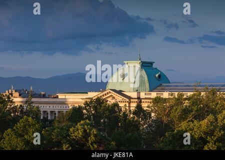 Bulgaria, Sofia, Ploshtad Narodno Sabranie Square, elevated view of National Library, dusk Stock Photo