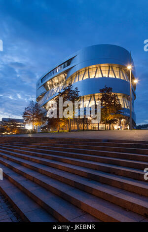 Germany, Baden-Wuerttemberg, Stuttgart - Untertuerkheim, Mercedes-Benz Museum building, dawn Stock Photo