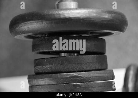 dumbbells in different sizes and weights, Bodybuilding weights for muscle building Stock Photo