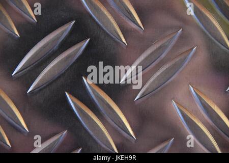 pink light reflections on a corrugated aluminum plate, Aluminium sheet Stock Photo