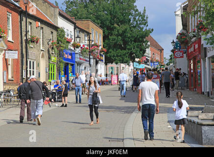 Shoppers in pedestrianised street, King Street, town centre, Thetford, Norfolk, England, UK Stock Photo