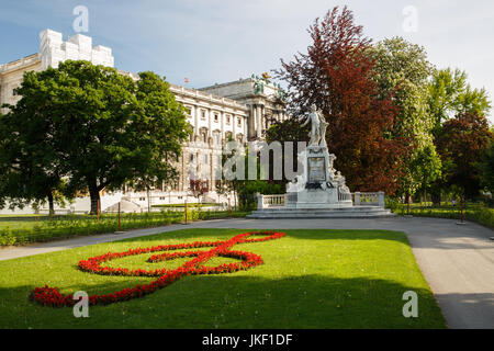 Statue of Wolfgang Amadeus Mozart (Austrian sculptor Victor Tilgner, 1896) in public Burggarten park in the center of Vienna. Austria Stock Photo