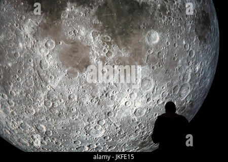 Birmingham, UK. 23rd July, 2017. Museum of the Moon is a new touring artwork by UK artist Luke Jerram. The art installation uses detailed imagery from NASA of the lunar surface to create a scale replica of the moon (approximate scale of 1:500,000). Measuring seven metres in diameter, the installation is a fusion of lunar imagery, moonlight and surround sound musical composition created by BAFTA and Ivor Novello award-winning composer Dan Jones. Credit: steven roe/Alamy Live News Stock Photo