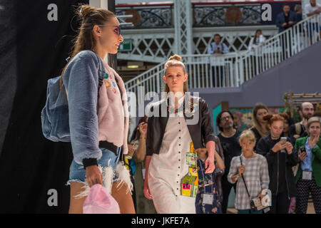 London, UK. 23 July 2017 Models on catwalk on the opening day of Pure London showcasing designs from a mix of new and established labels. © Laura De Meo/ Alamy Live News Stock Photo