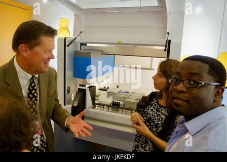 Paris, France, IAS, International AIDS Society Meeting, Medical Trade Show,, Businessman, talking about HIV, testing equipment Stock Photo