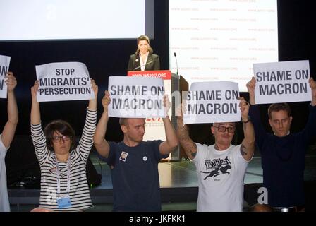 Paris, France, IAS, International AIDS Society Meeting, AIDS Activists Protesting French President Macron's non-appearance to conference, represented by Agnes Buzyn, Minister of Solidarity and Health, Woman Giving Speech, French aids protest poster Stock Photo