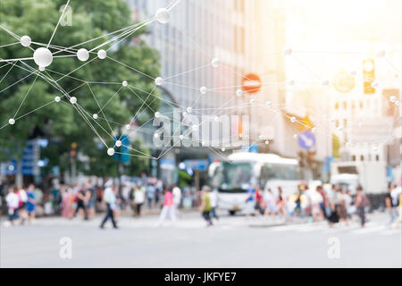 Big data , iot , artificial intelligence (ai) technology every where , smart city technology concept. Neural networks connect atoms and blur city peop Stock Photo