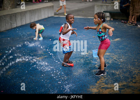 New York City, Manhattan, United States, Central Park childrens play area Heckscher Playground,  children playing with he water features Stock Photo