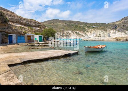 Picturesque fishing village of Mandrakia with traditional shelters for the boats (sirmata), Milos Island. Greece. Stock Photo