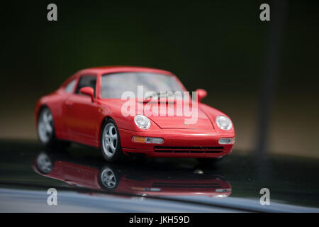 Porsche 993 911 Carrera with little 911 model, close-ups and POV, in Mainz, Germany Stock Photo