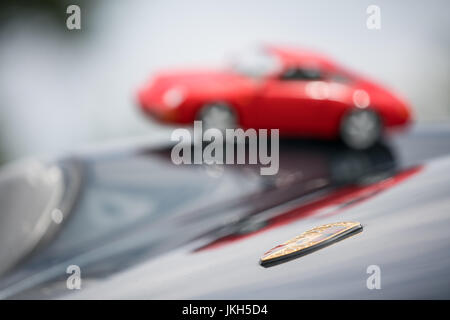 Porsche 993 911 Carrera with little 911 model, close-ups and POV, in Mainz, Germany Stock Photo