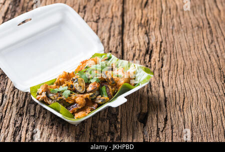 Oysters fried - crispy mussel with bean sprout, Crisp fried oyster pancake in foam box Stock Photo