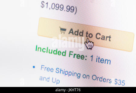 hand mouse cursor on add to cart button Stock Photo