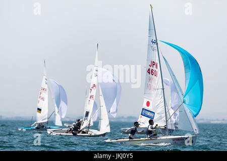 Thessaloniki, Greece - July 12, 2017: Athletes yachts in action during '2017 Men's 470 World Championship' class sailing Stock Photo