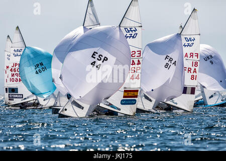 Thessaloniki, Greece - July 12, 2017: Athletes yachts in action during '2017 Men's 470 World Championship' class sailing Stock Photo