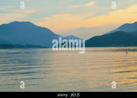 Landscape of Mountain ranges in Japan around lake Kawaguchiko at dusk Stock Photo