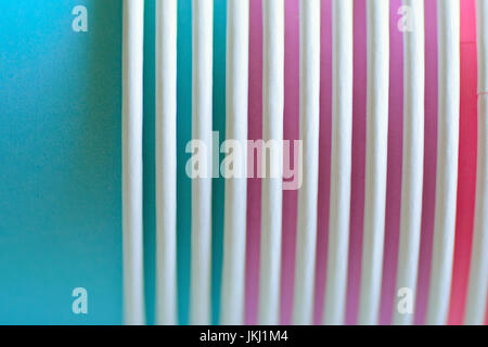 Macro details of lined up colorful paper cups in horizontal frame Stock Photo