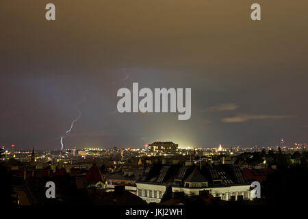 Nightly thunder over Vienna, a lightning strikes Stock Photo