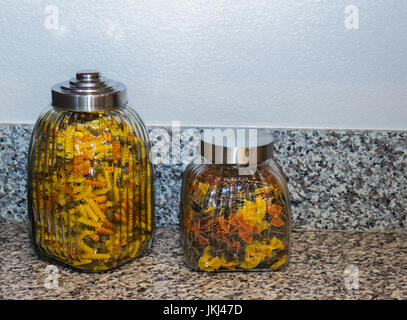 Two Pasta Containers On Granite Counter Stock Photo
