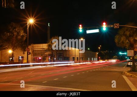 Traffic Intersection at Smith Street College Park Orlando at Night in a Long Time Exposure with Car Lights Creating Streaks Stock Photo