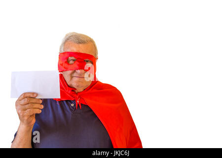 view from bottom of old man dressed as superhero showing blank envelope on white background Stock Photo