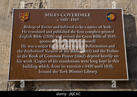 A plaque on York Minster in the historic city of York, dedicated to Miles Coverdale, who translated and published the first complete English Bible in  Stock Photo