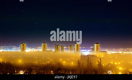 panoramic shot of shifting fog coming in from the river Clyde over the north of the city looking south Glasgow Scotland UK Stock Photo