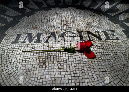 single red rose on the imagine mosaic dedicated to John Lennon in central park New York City USA Stock Photo