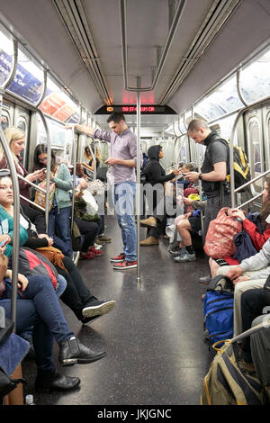 people on board new york city subway train carriage New York City USA Stock Photo