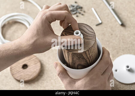 Lamp assembling in workshop Stock Photo